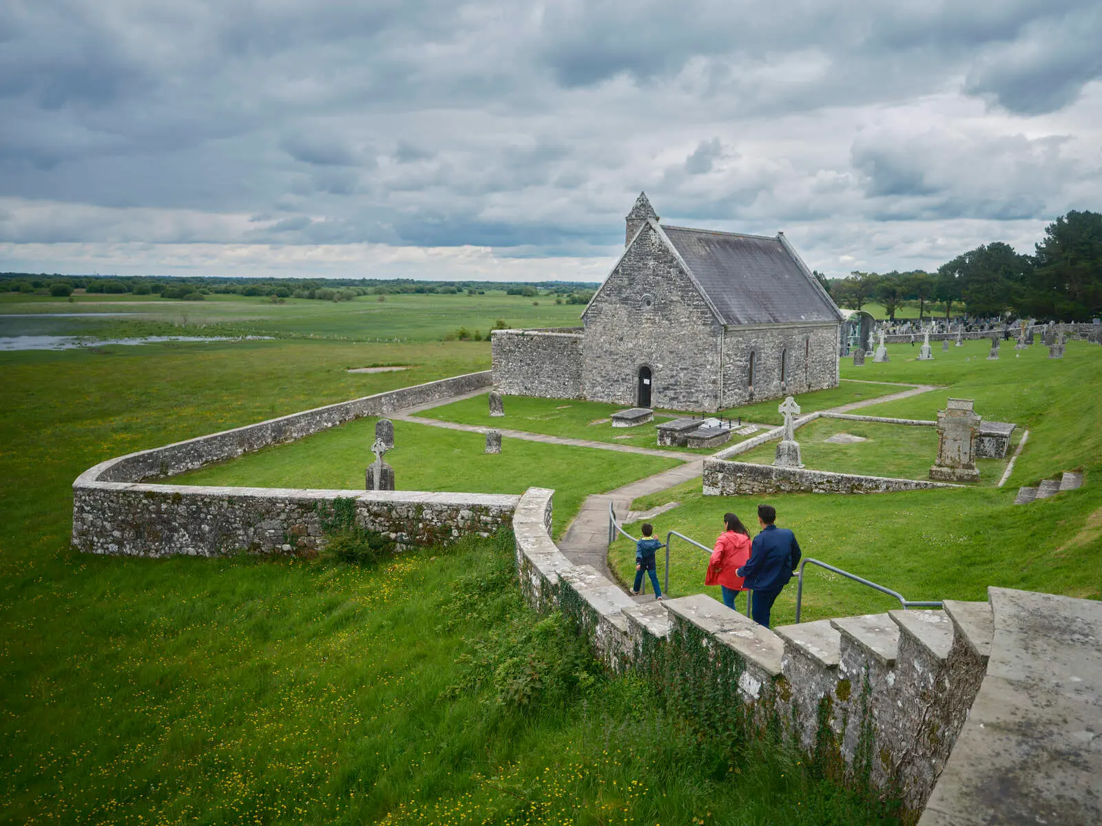 The churches and high crosses of Clonmacnoise above the flooded callows of the River Shannon